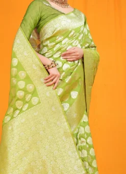 Zari Weaving Patola Silk Green Color Saree Festive Wear